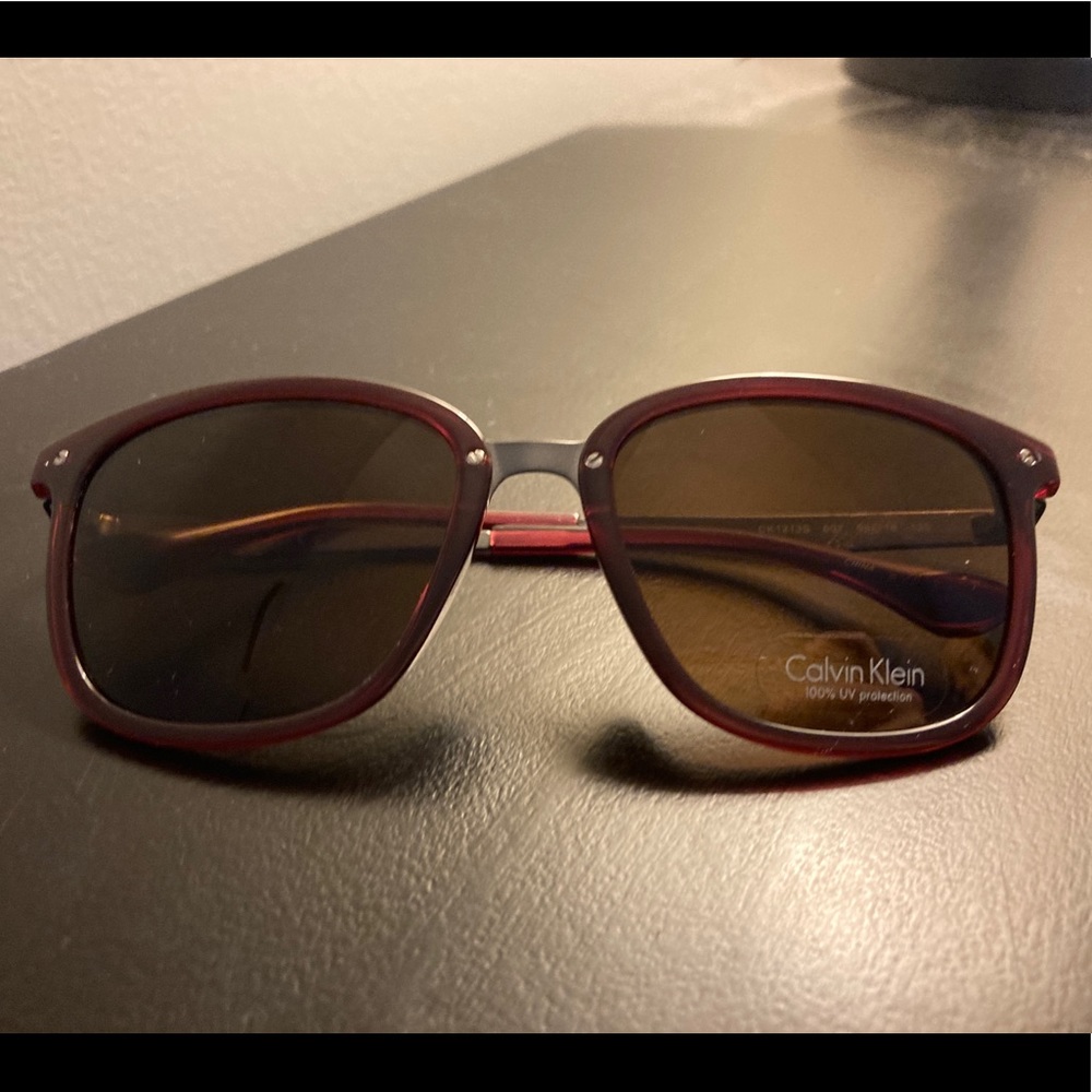 Calvin Klein Platinum CK1213S Sunglasses Color: 617 Wine New With Case, Womens